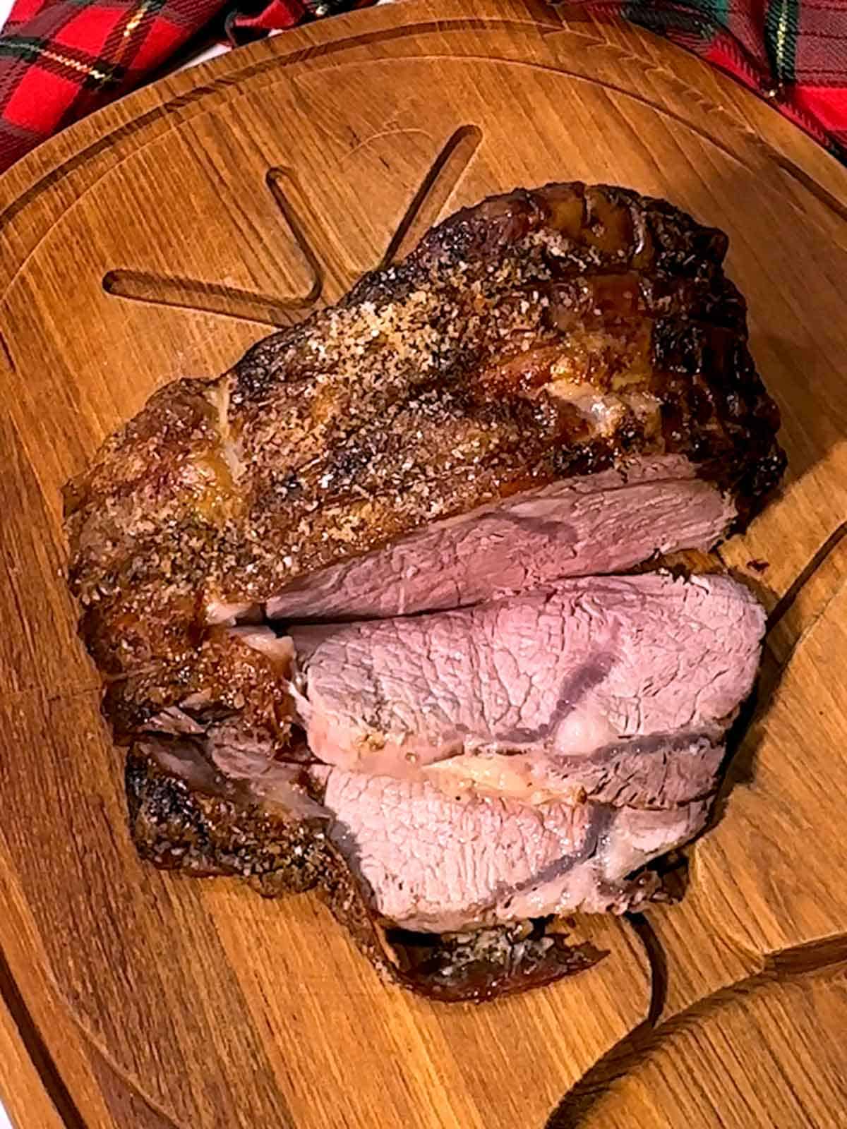 Rib Roast cut on a cutting board.