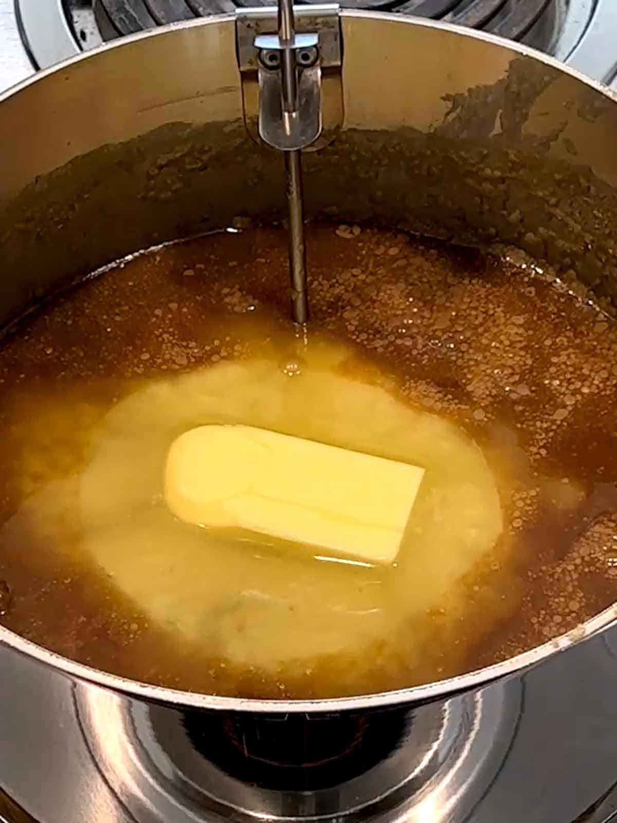 Butter added to the praline mixture.