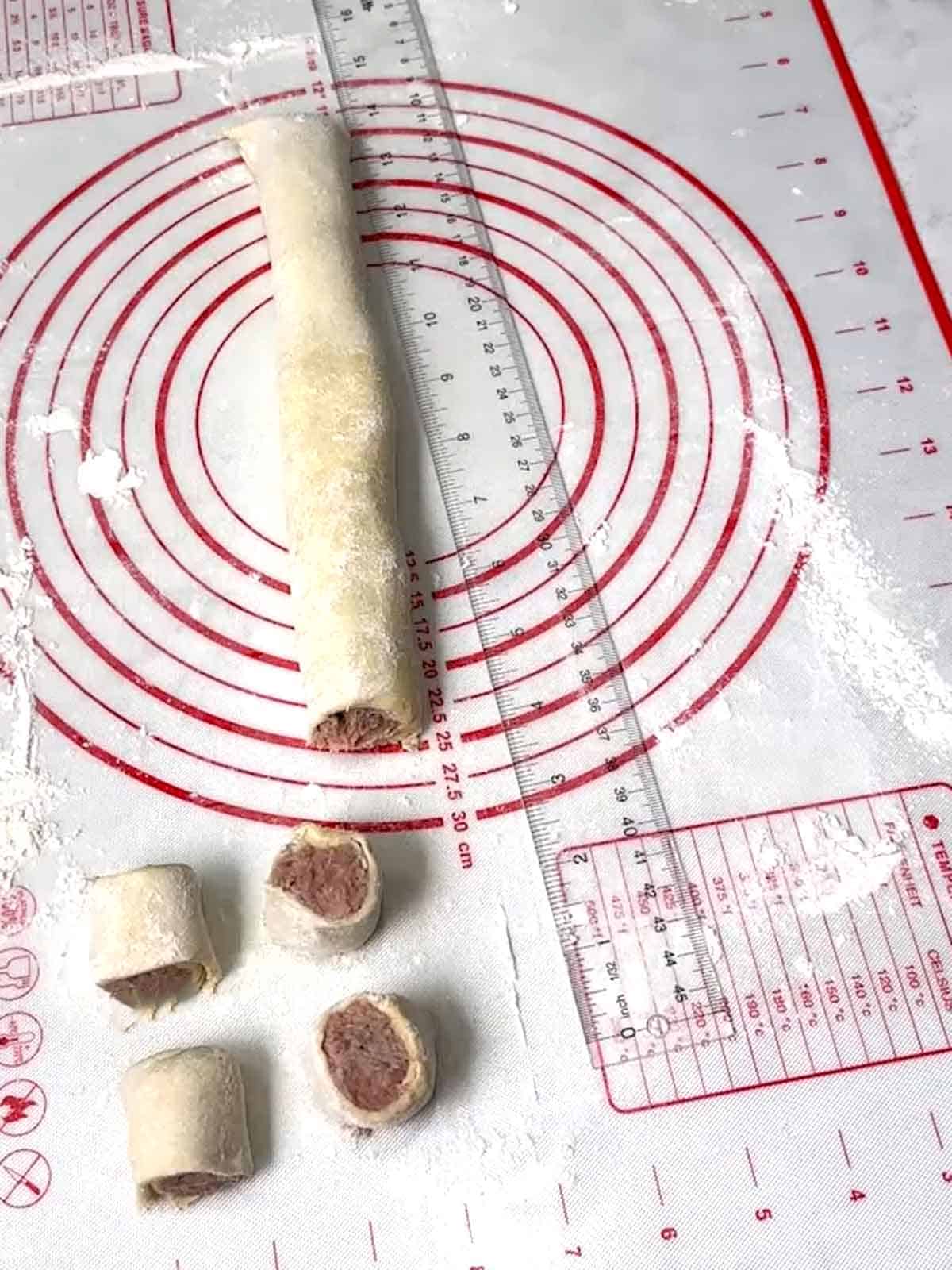 Cut sausage roll into bites.