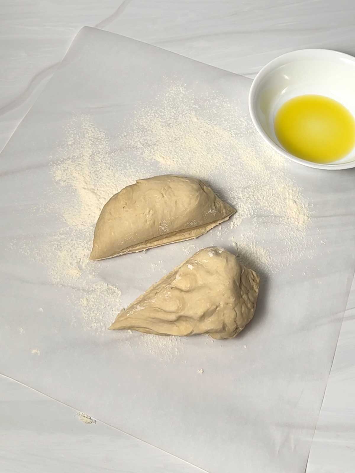 Dough cut in half.