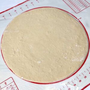Rolled pizza dough.