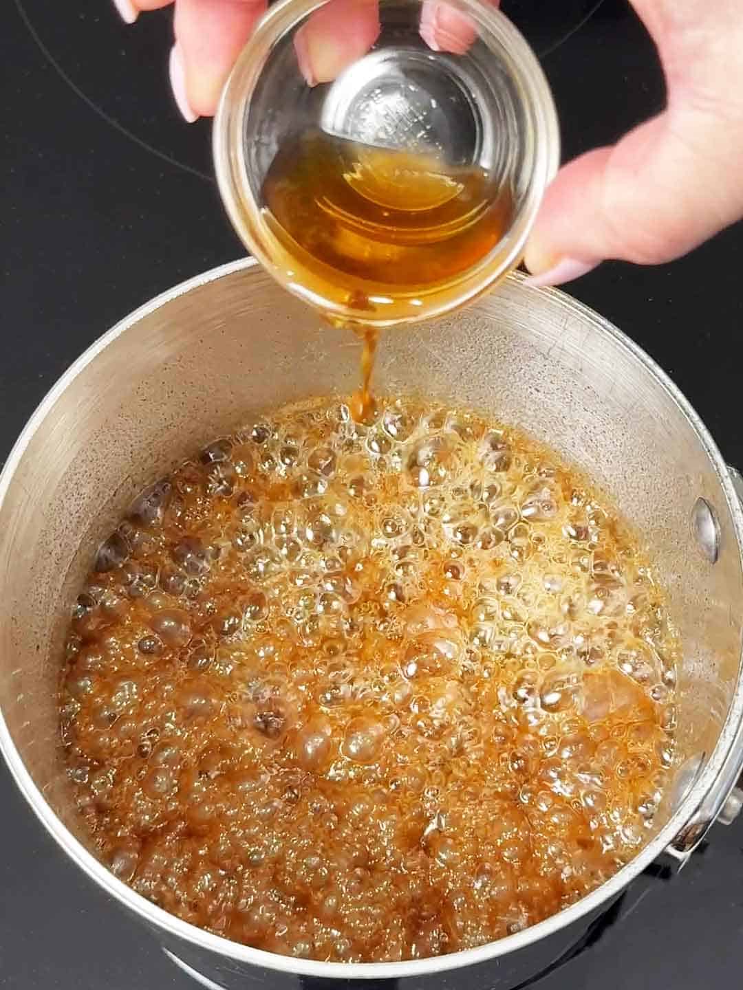 adding vanilla extract to the toffee mixture