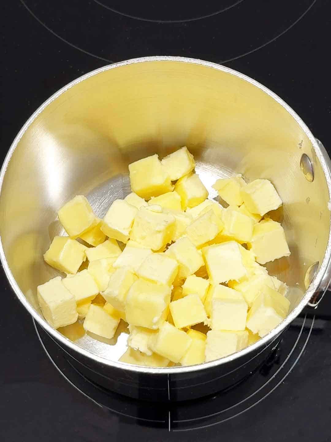 cubed butter in pan