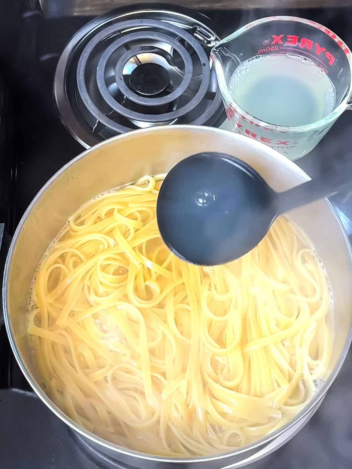 cooking pasta and reserving water