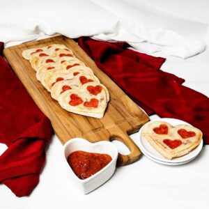Easy mini heart-shaped tortilla pizzas.