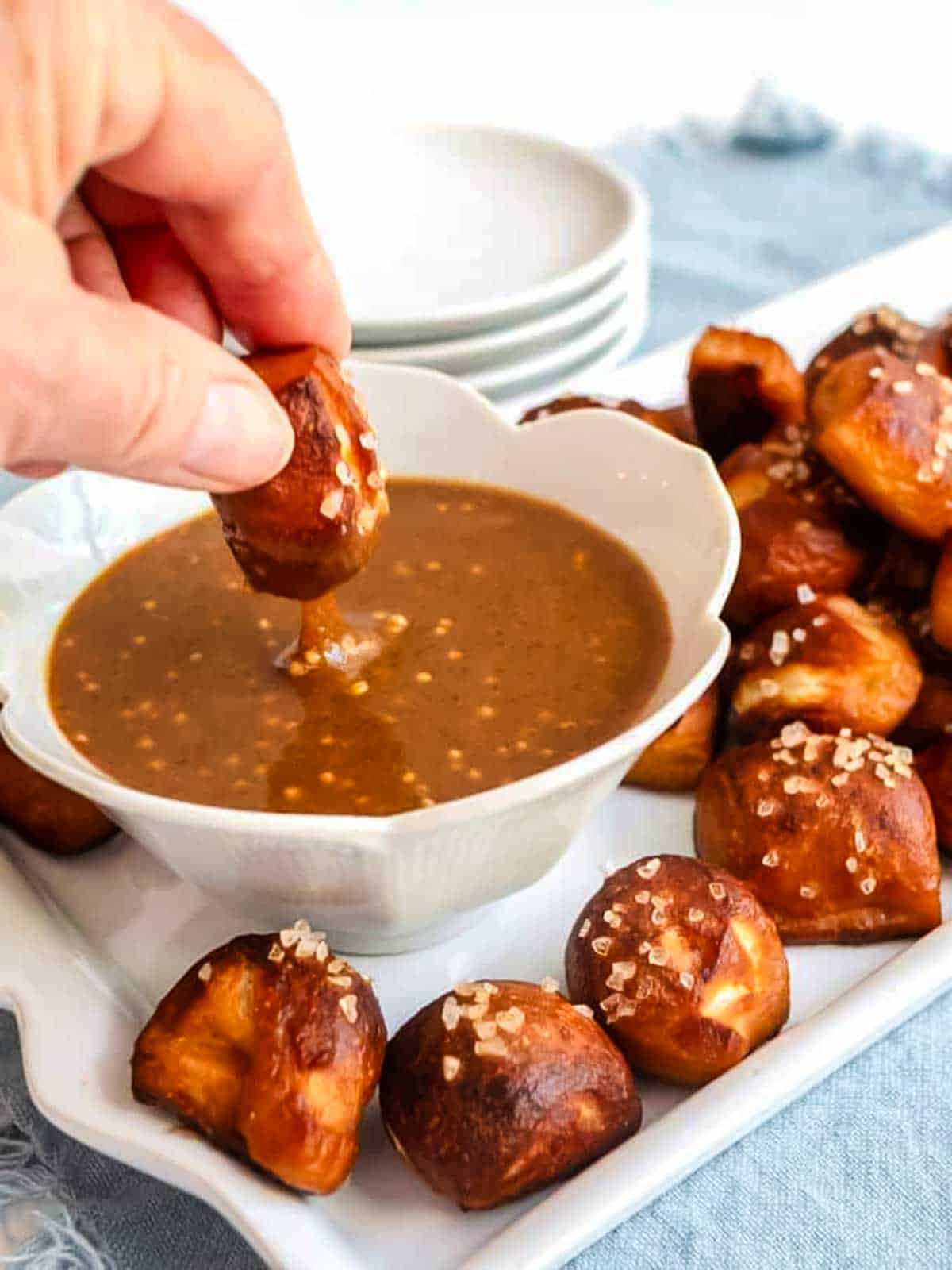 Dipping easy pretzel bites into dip