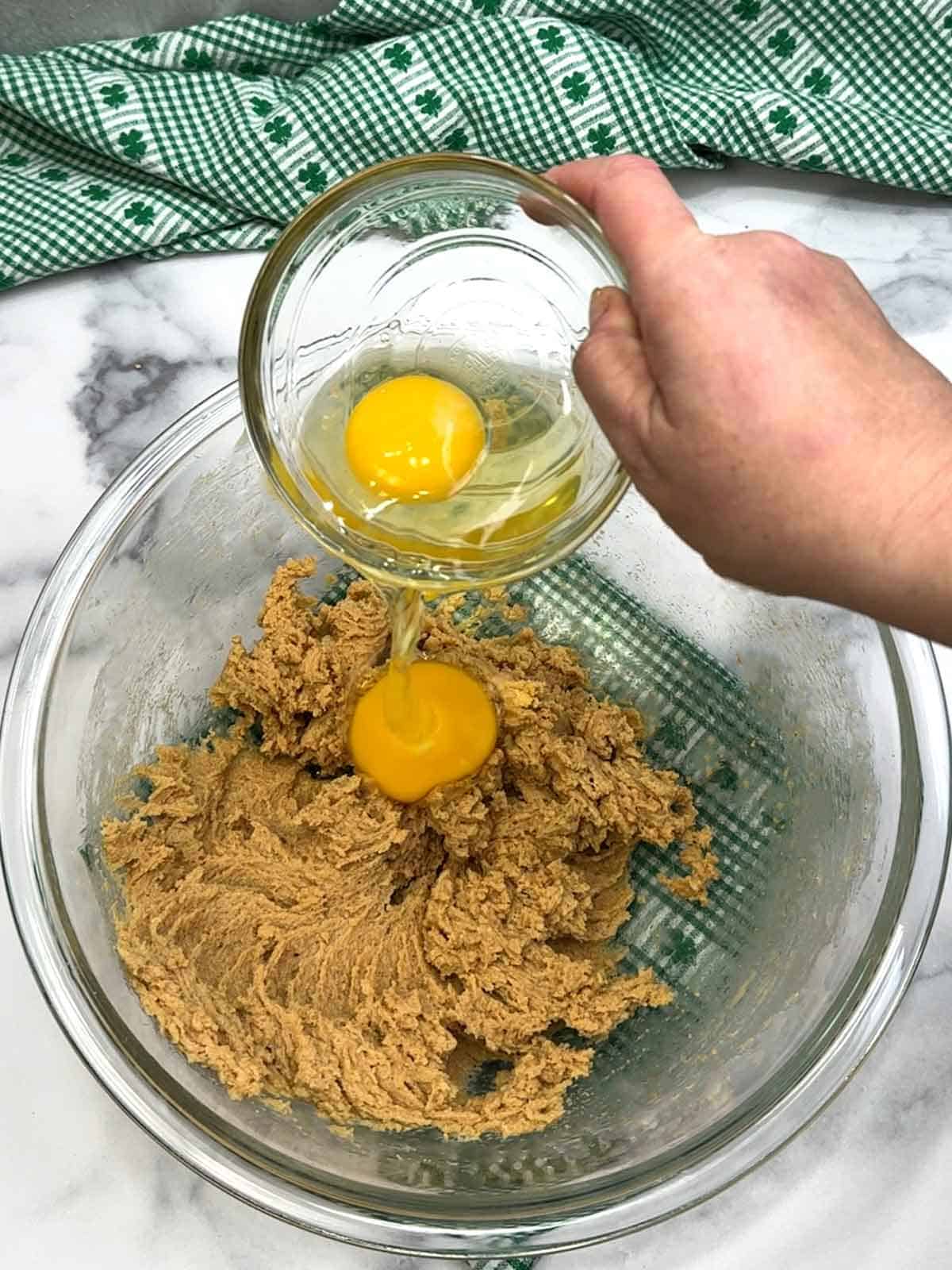 adding eggs