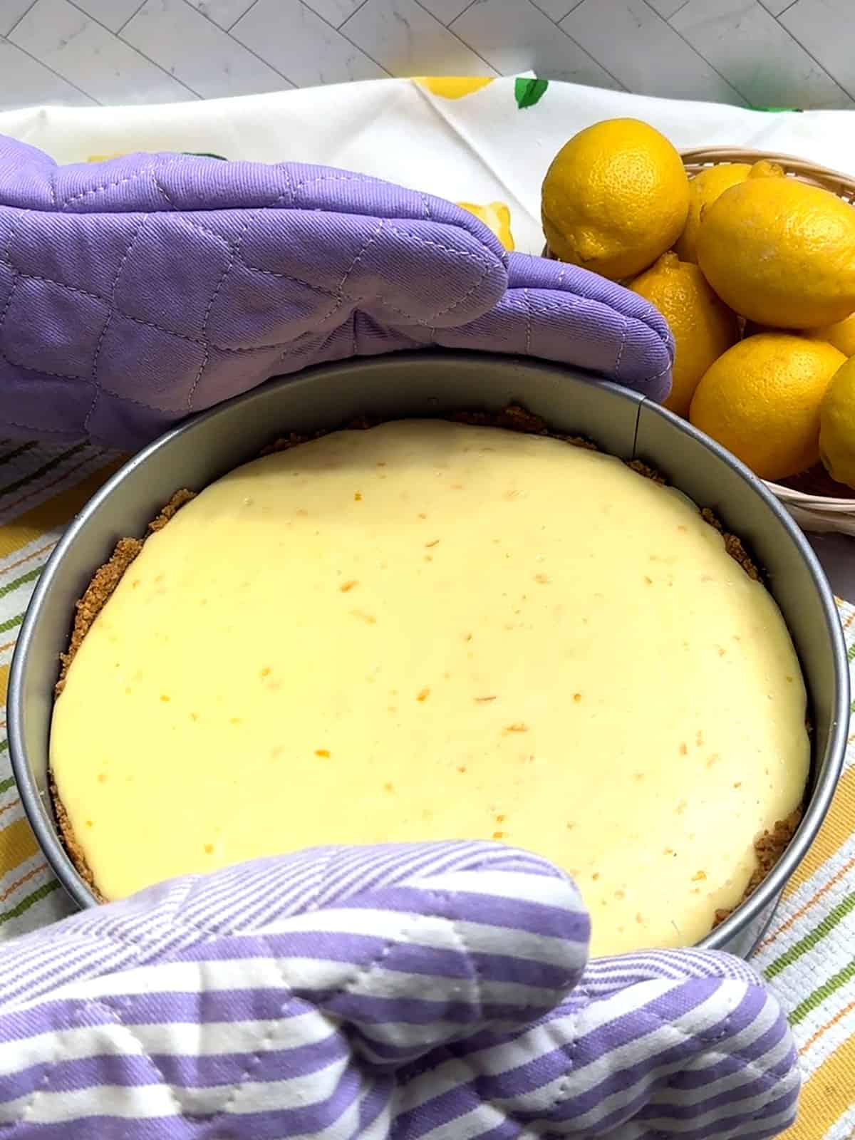 removing cheesecake from the oven
