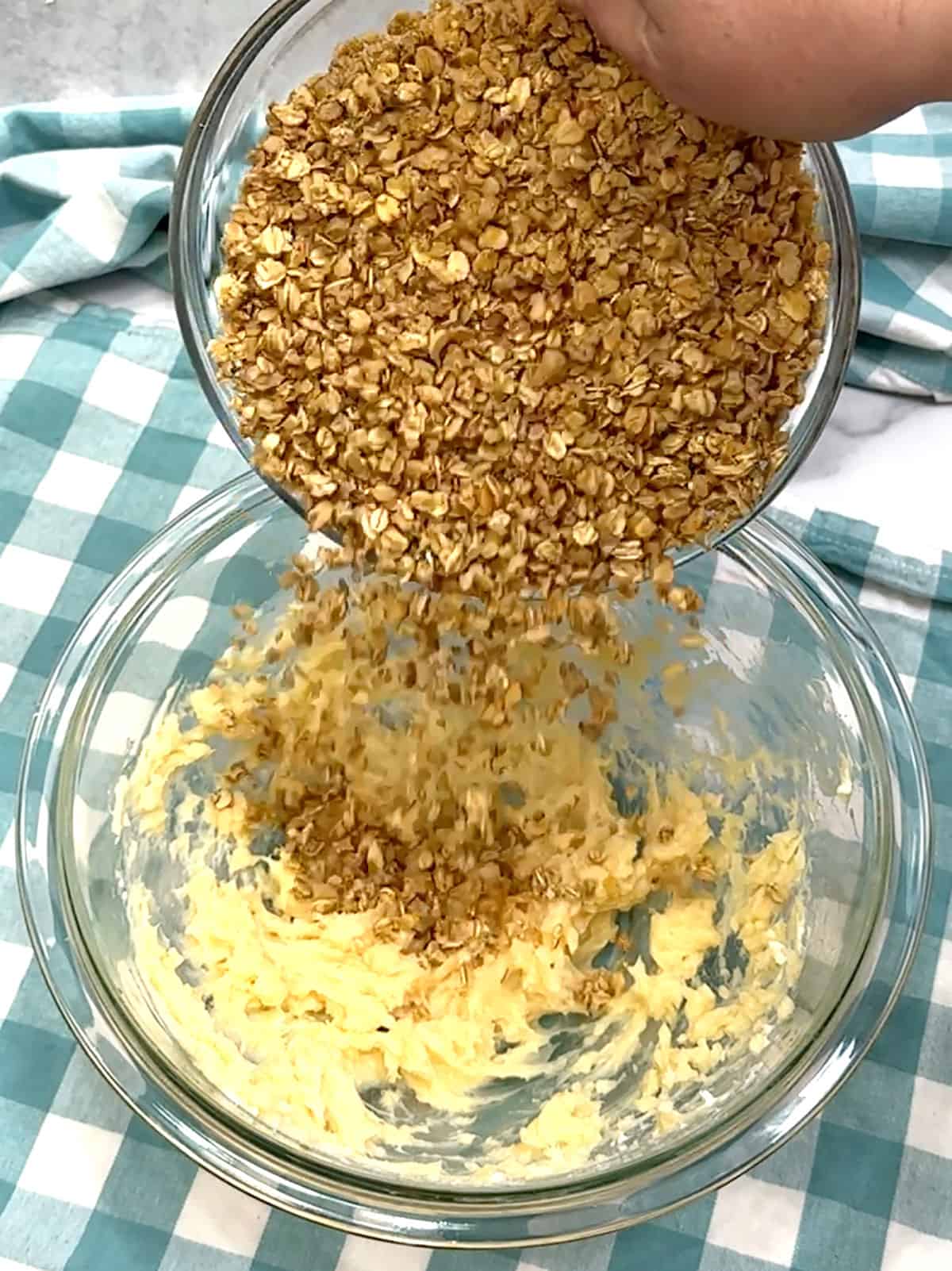 combining granola and honey-butter for crust