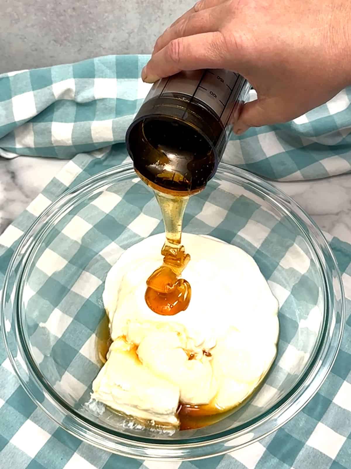 adding honey to yogurt 