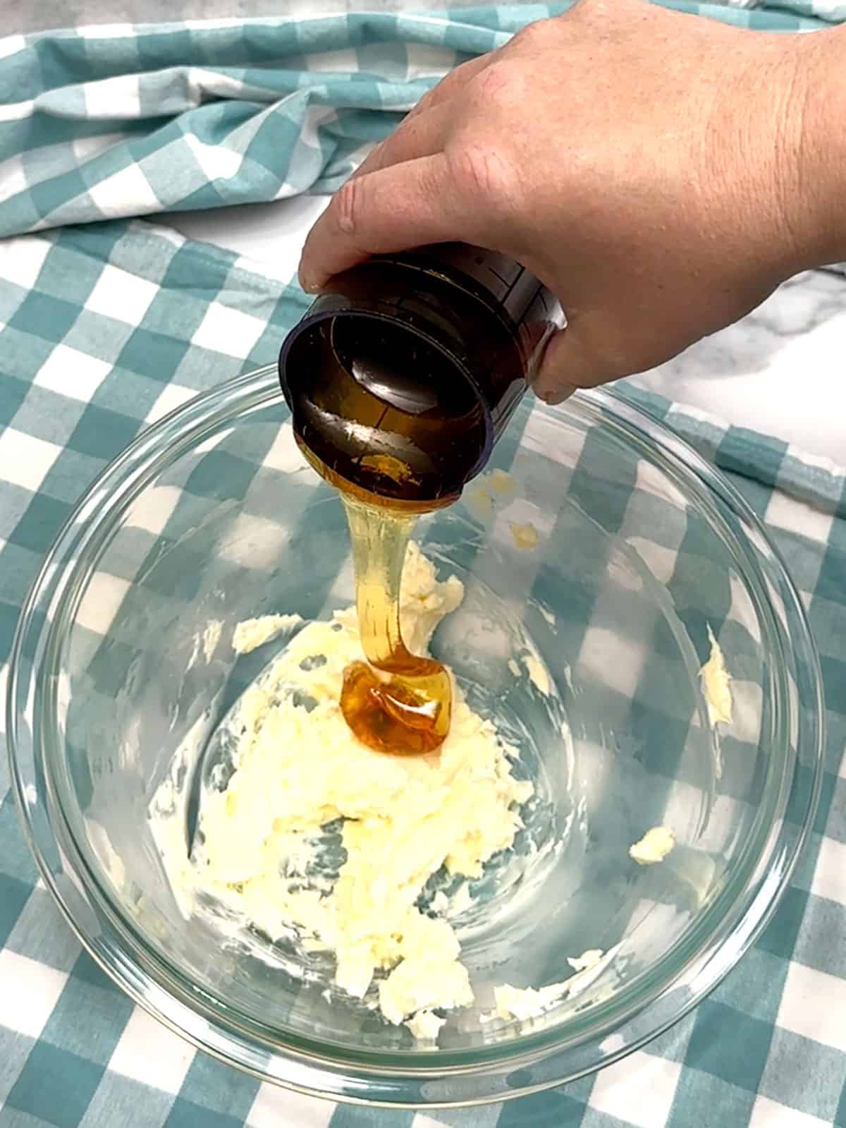 combining honey and butter for crust