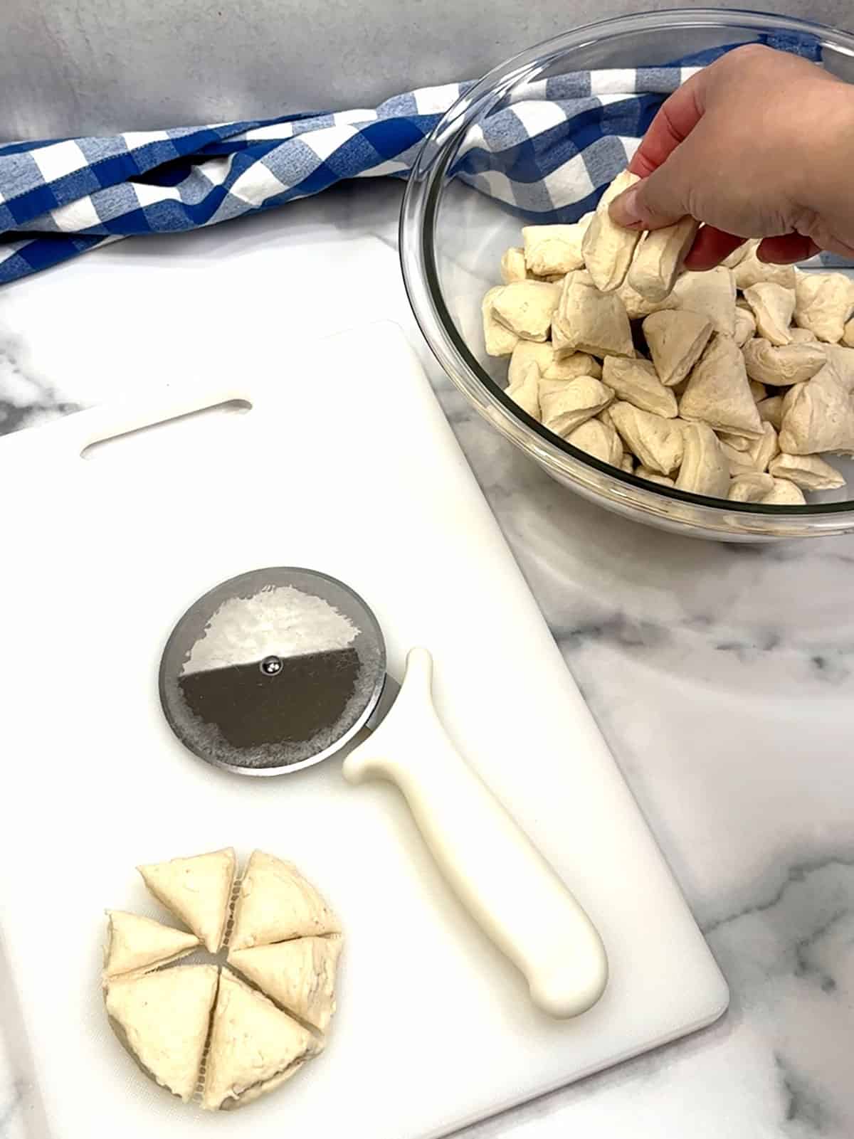 cutting biscuits for Bacon Egg & Cheese Biscuit Bundt cake