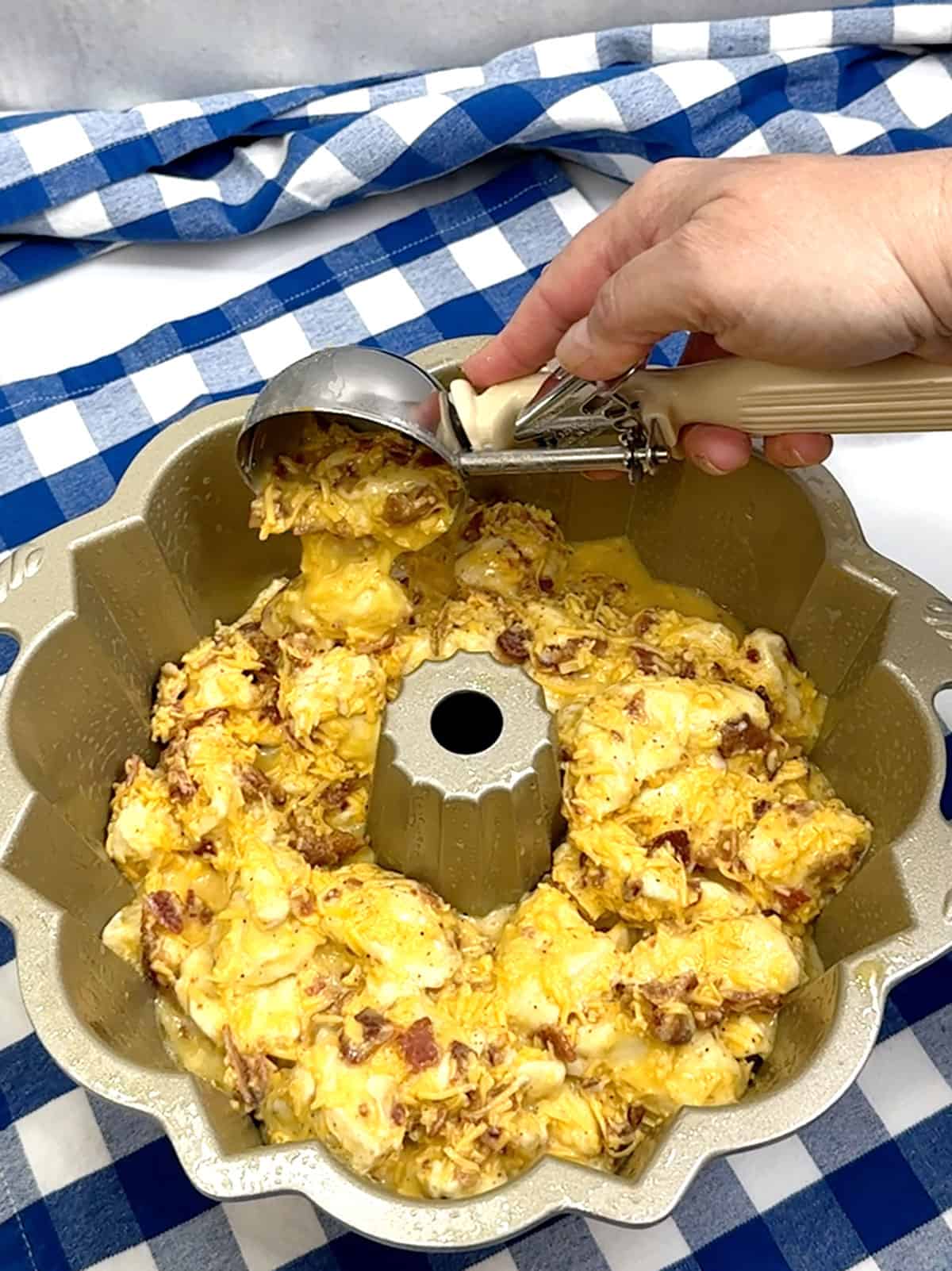 transferring mixture to bundt pan