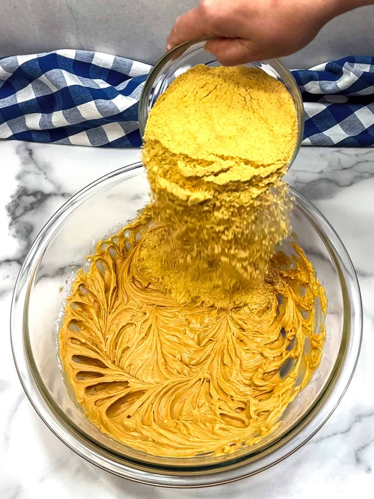 adding graham cracker crumbs