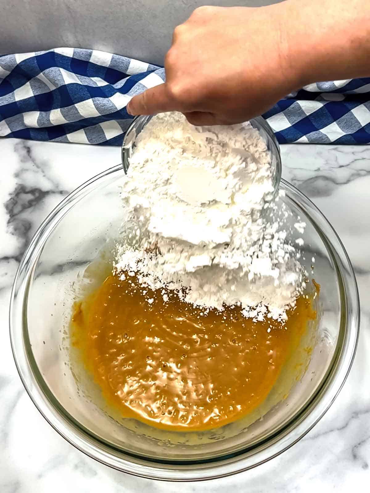 adding powdered sugar