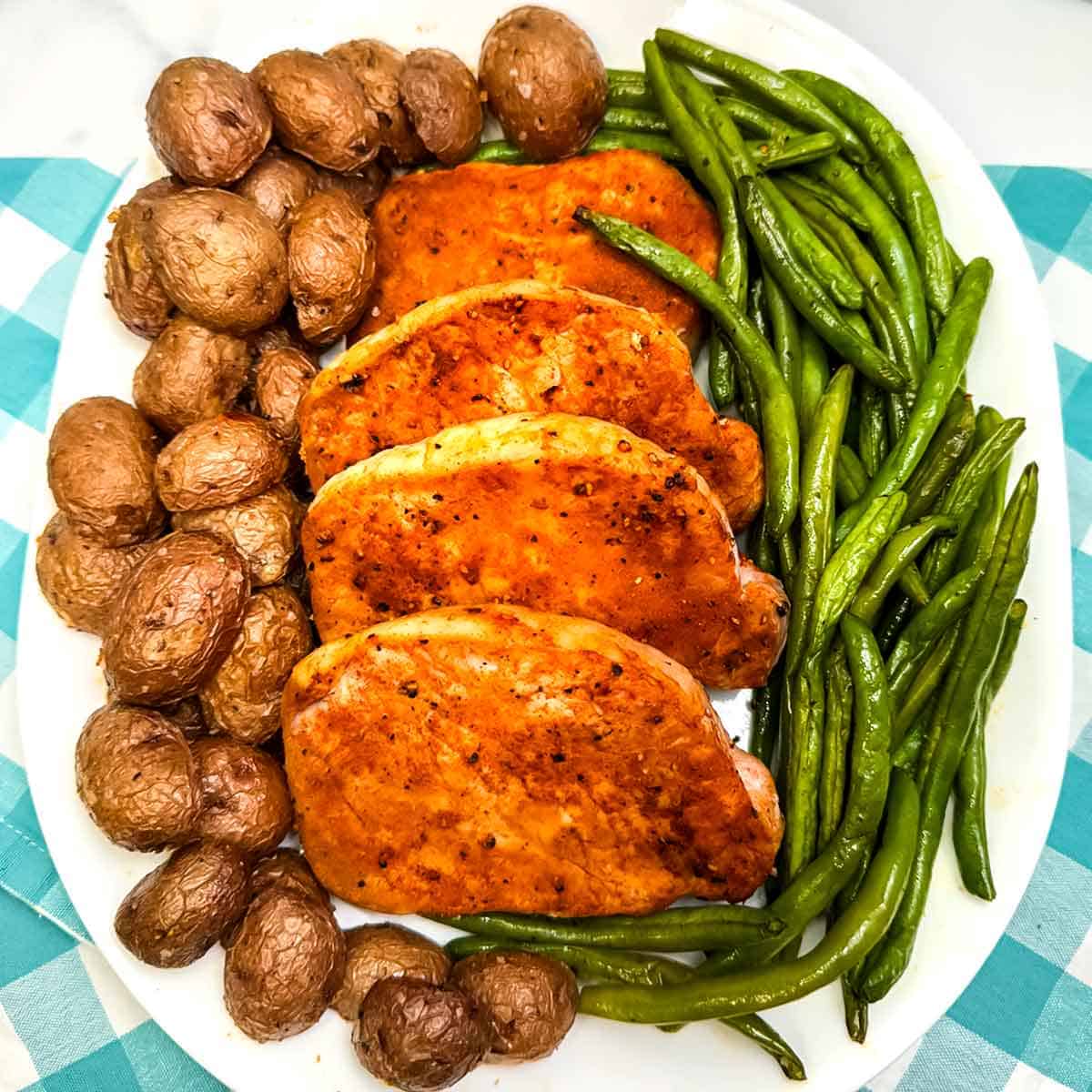 pork chops green beans potatoes italian dressing Easy Sheet Pan Pork Chops with Potatoes and Green Beans