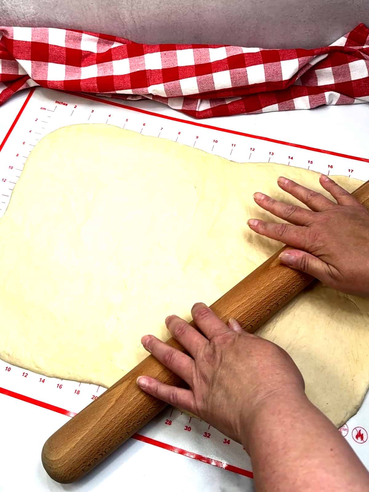 rolling pizza dough