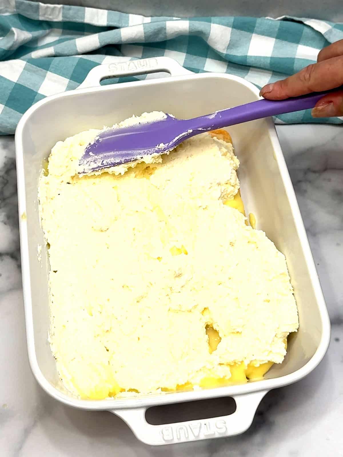 spreading bottom mascarpone layer
