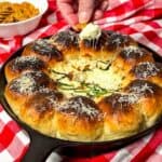 Three cheese white pizza dip with dipping pasta chips.