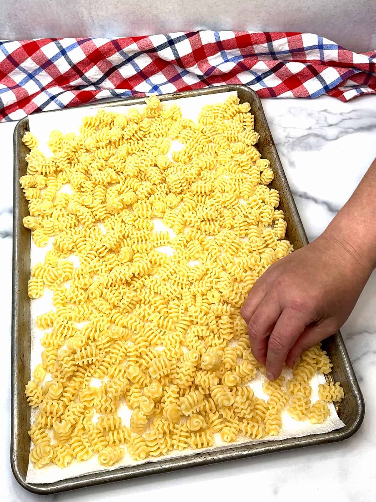 drying cooked pasta on paper towels