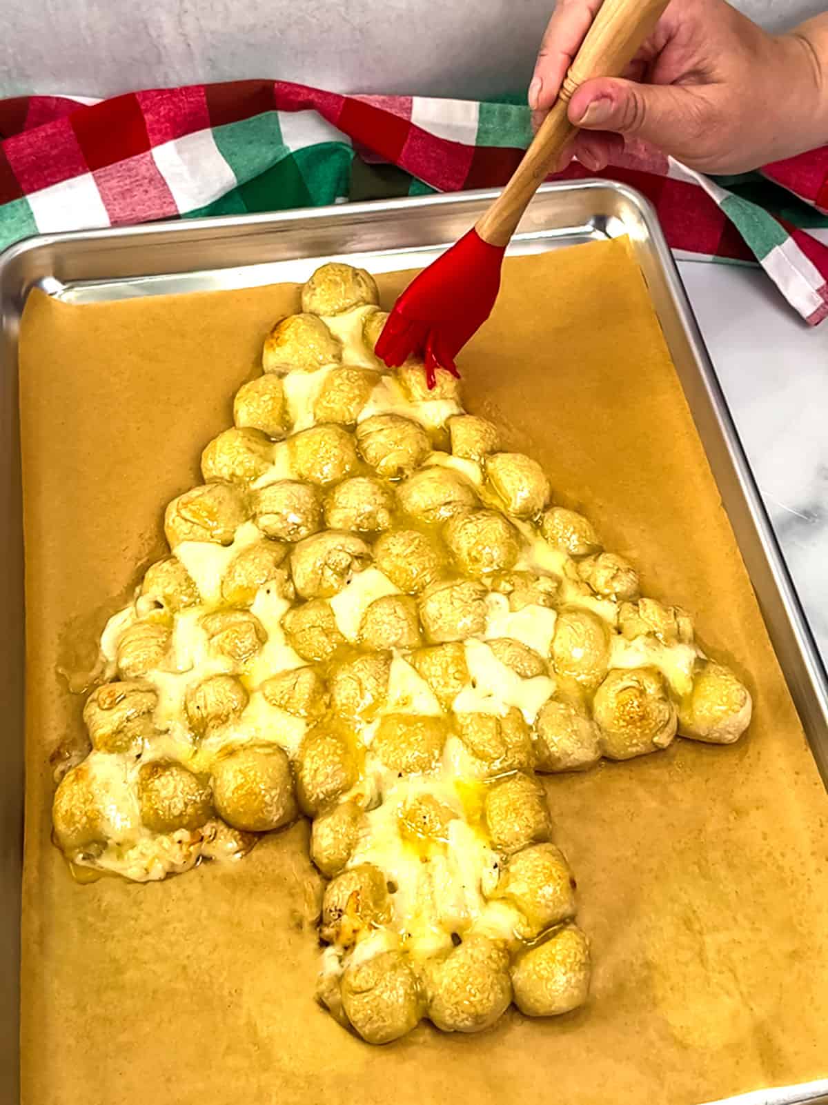 brushing garlic butter