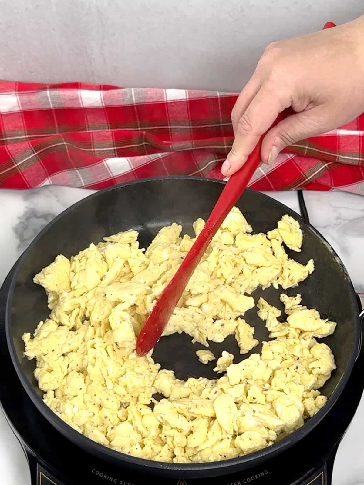 stirring scrambled eggs