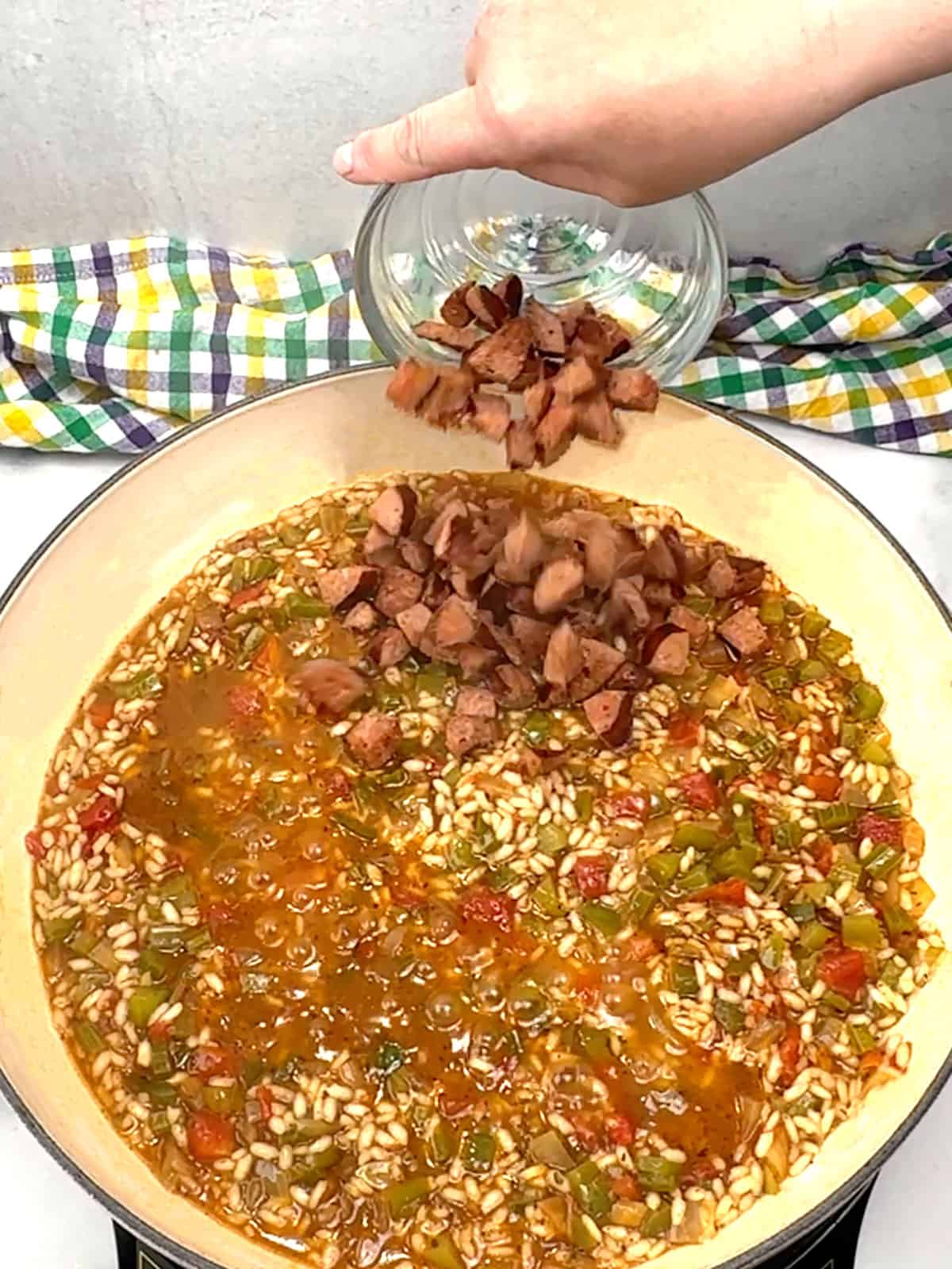 returning andouille to pot