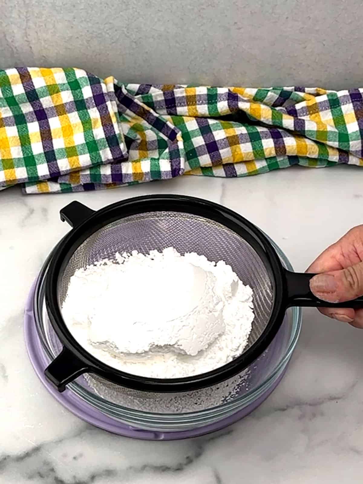 sifting powdered sugar 
