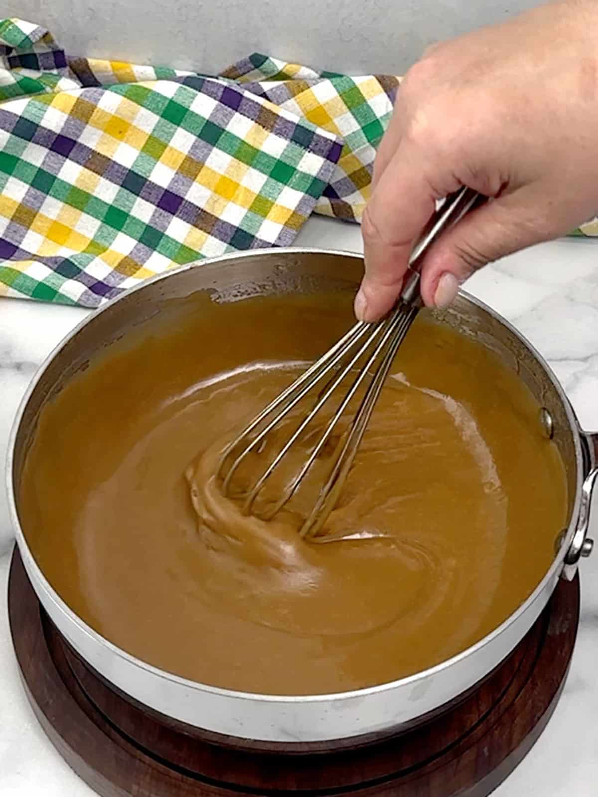 whisking frosting.