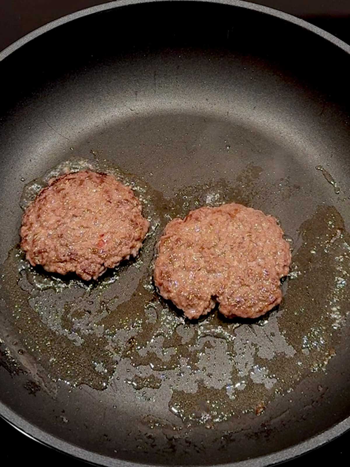 Cooking the burgers for the Big Mac Crunchwrap.