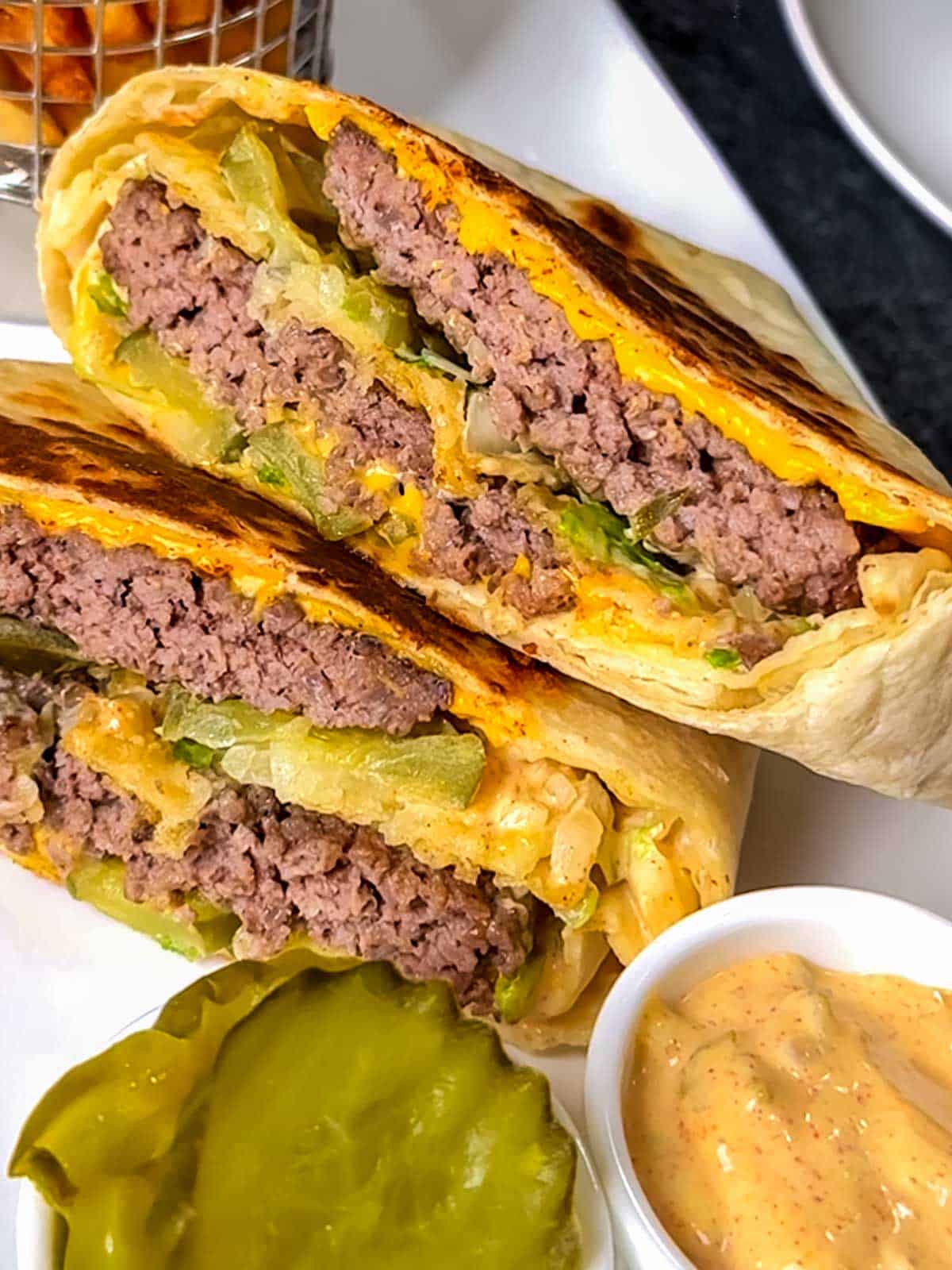 Big Mac Crunchwrap with special sauce and pickles.
