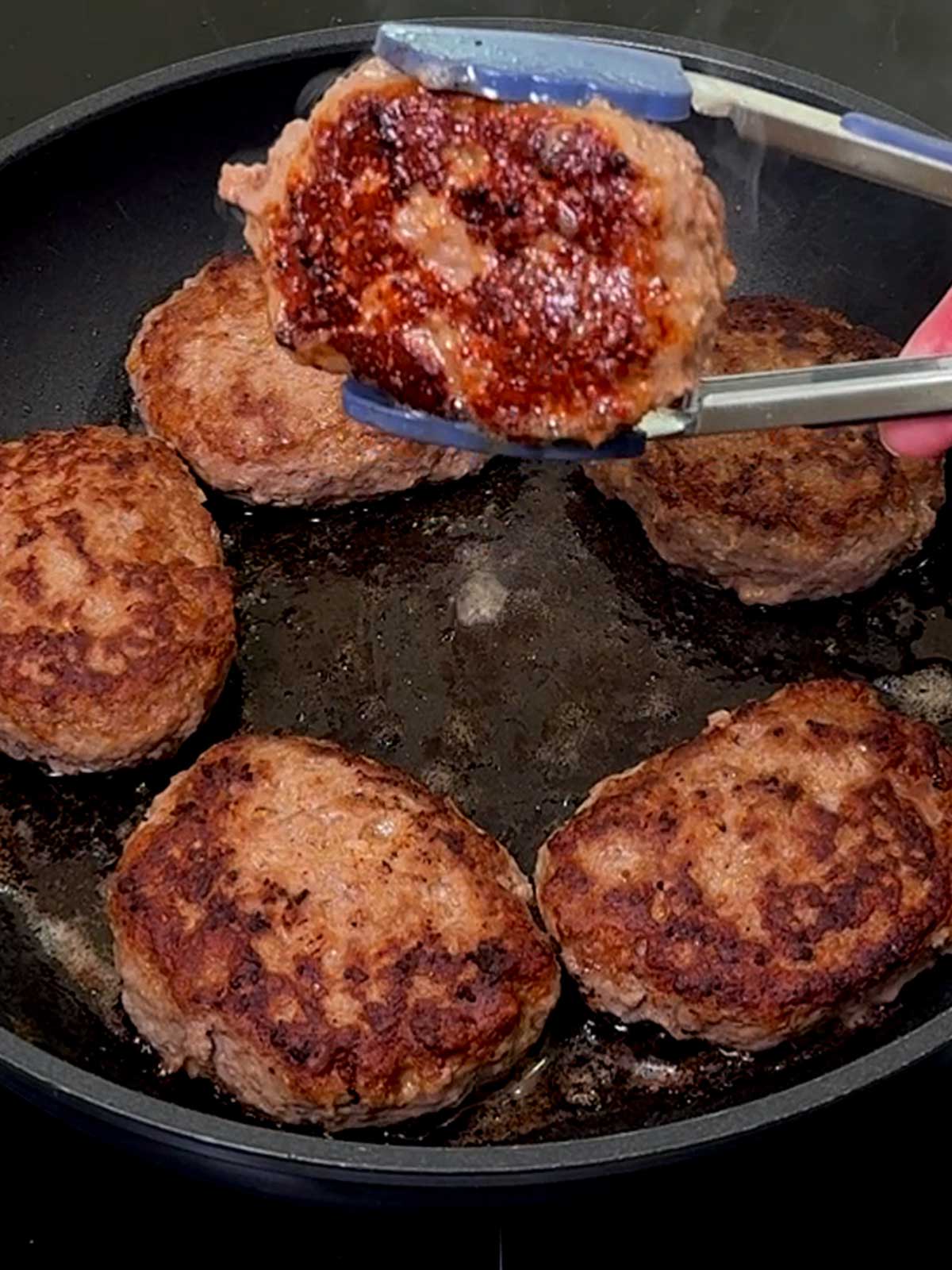 Other side of the beef patty golden brown.
