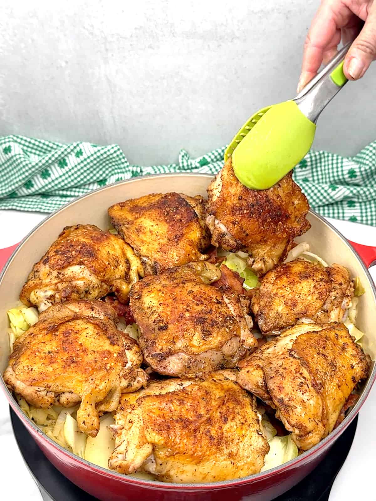 returning chicken thighs to pot