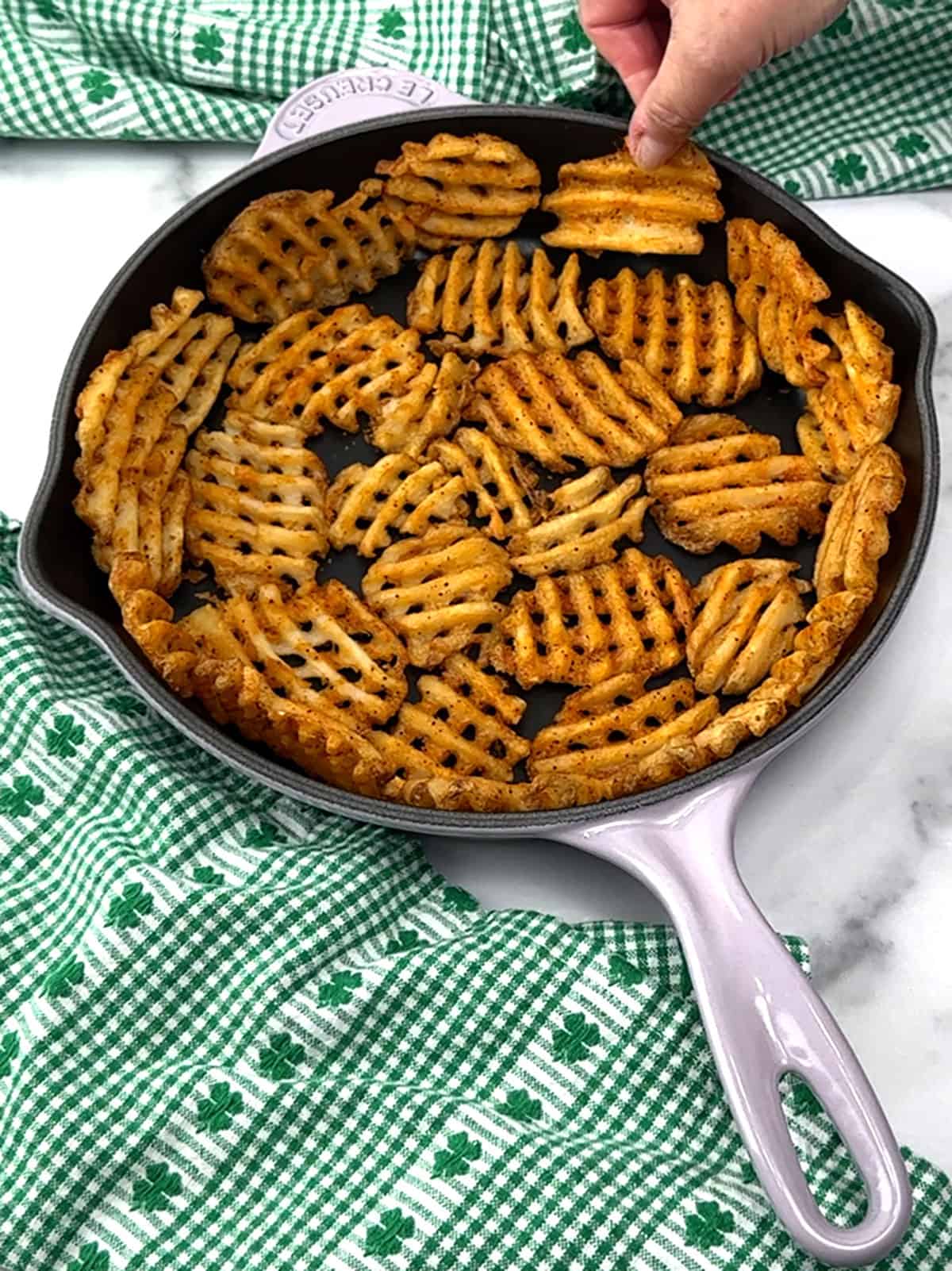 skillet lined with waffle fries
