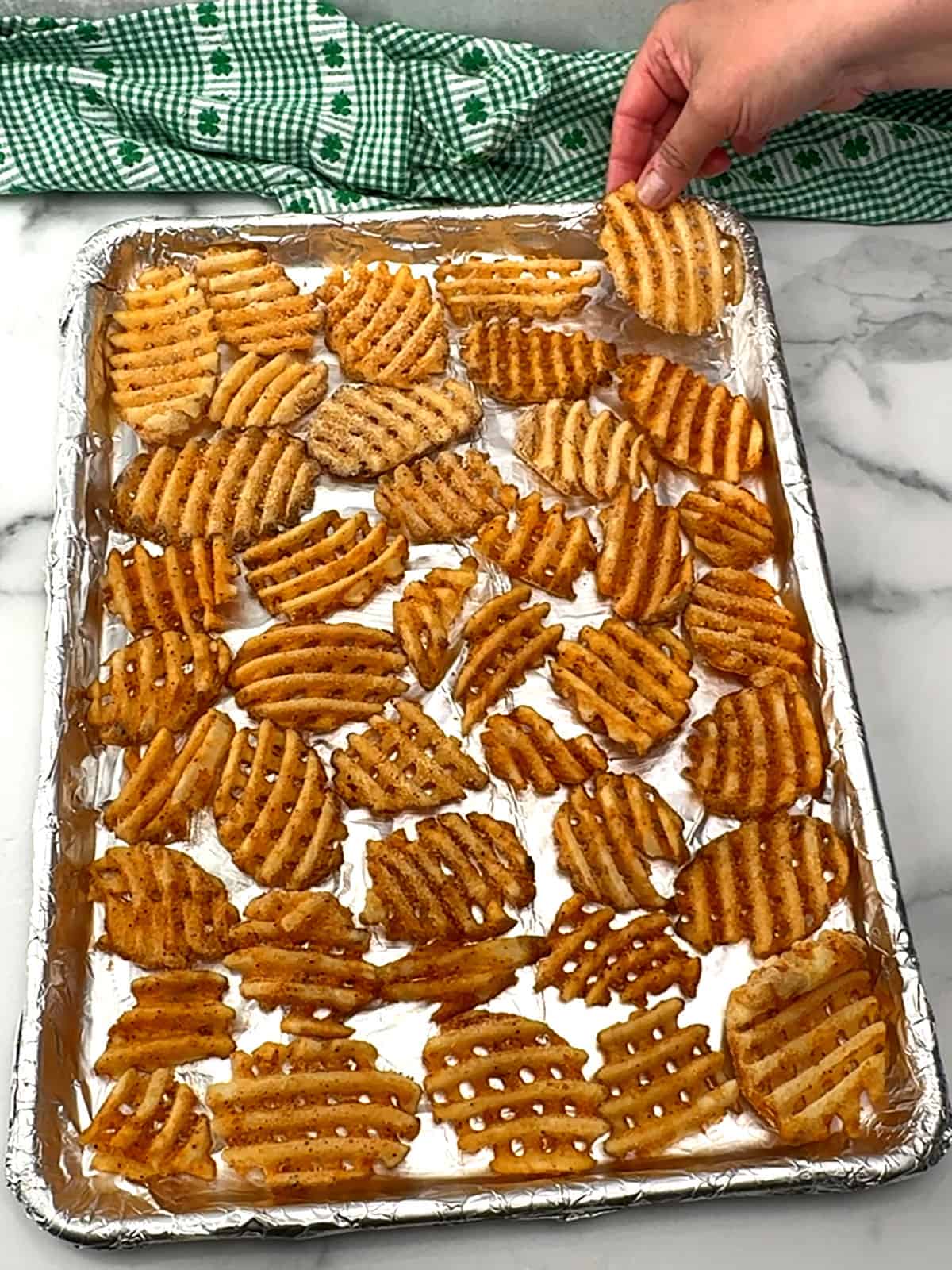 frozen waffle fries on sheet pan