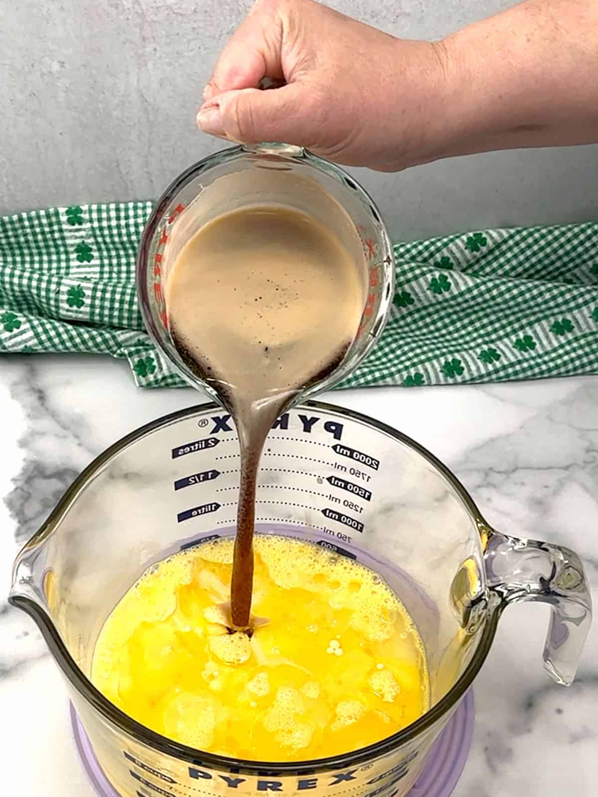 combining liquid ingredients for cake