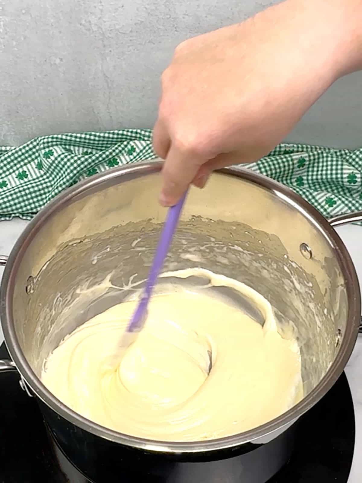 stirring marshmallow mixture