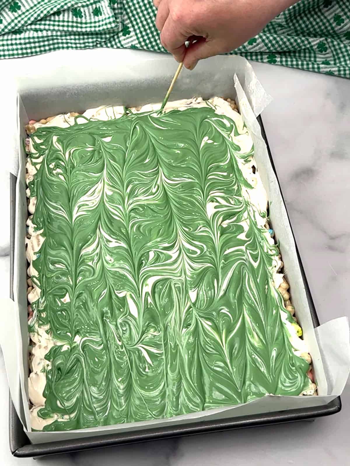 swirling candy melts together