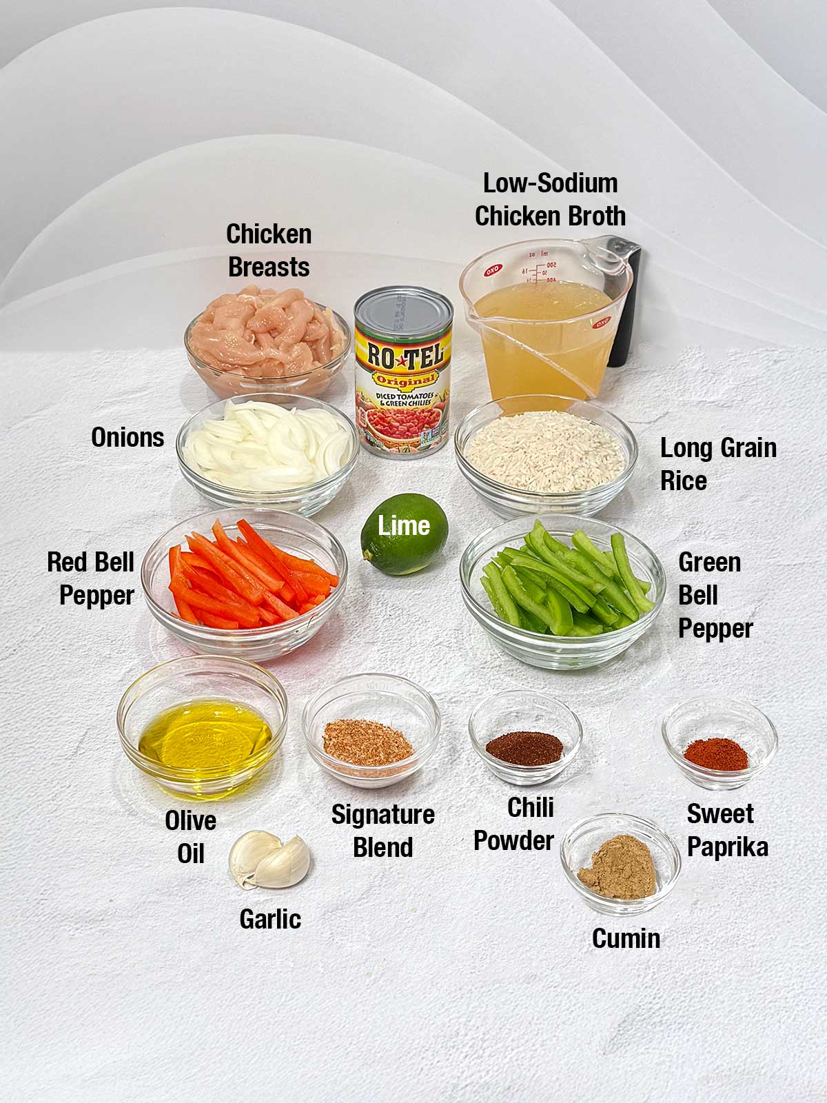 Ingredients for one-pot chicken fajita rice.