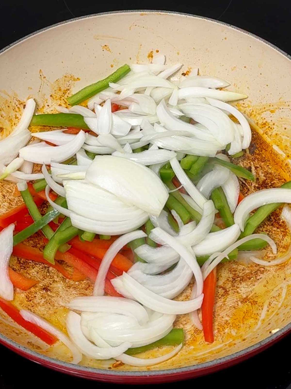Veggies added to pan.