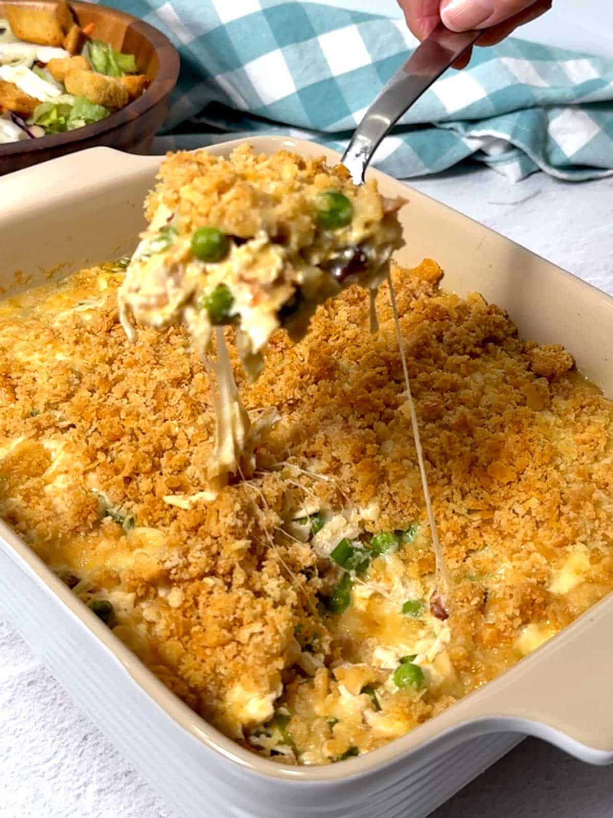 Serving Neiman Marcus-style chicken casserole.