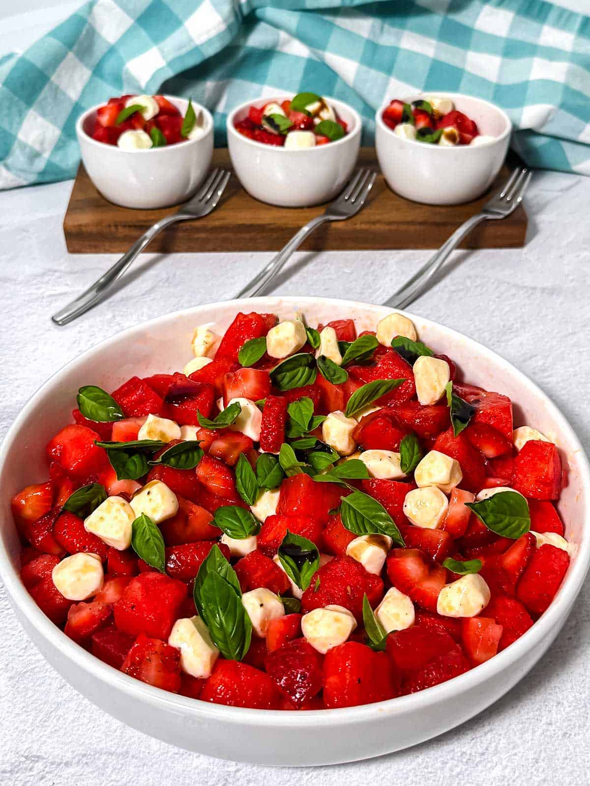 Watermelon strawberry caprese salad. Summer in a bowl.