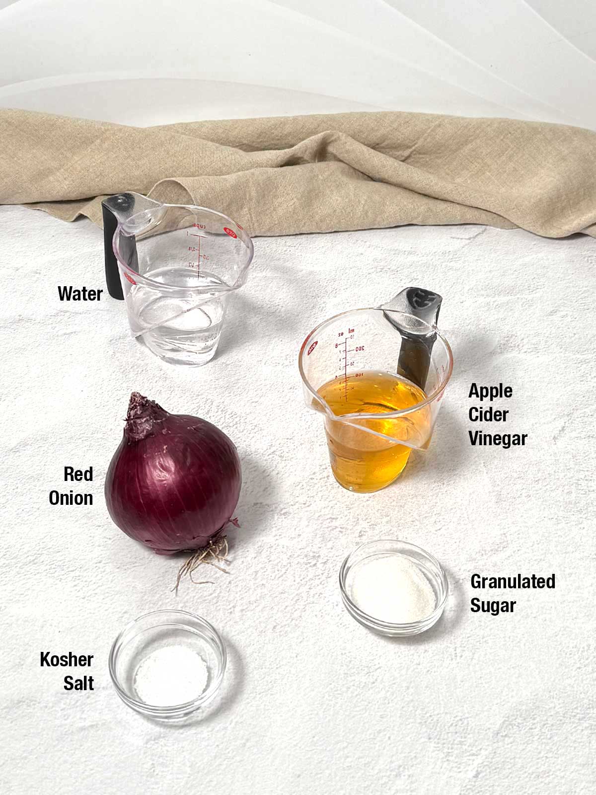 Simple ingredeints for pickled red onions.