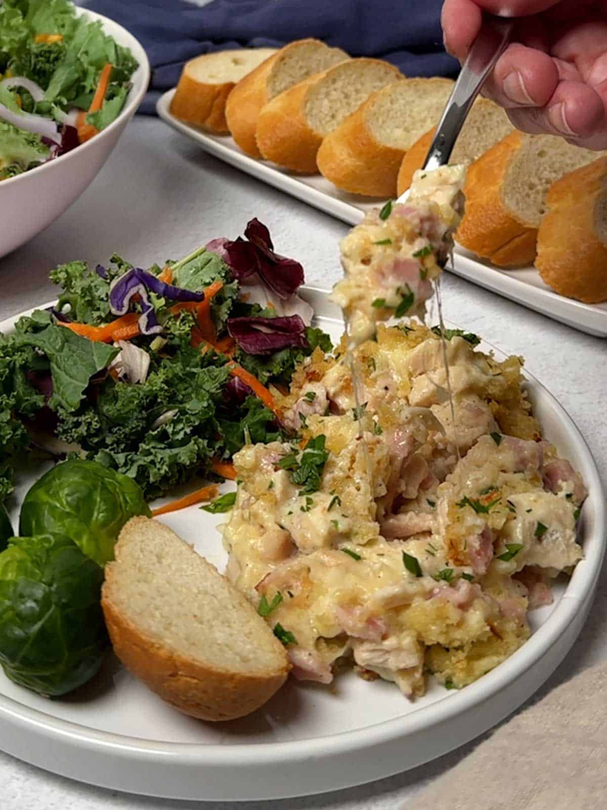 Eating Chicken Cordon Bleu Casserole.
