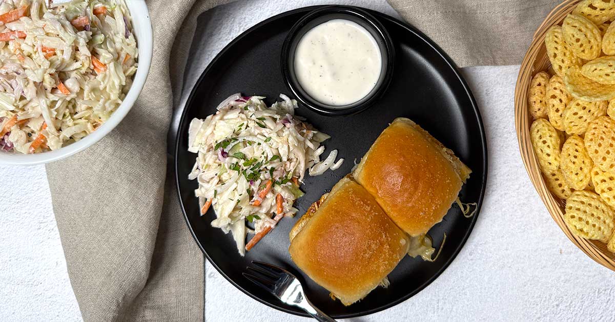 Chicken bacon ranch sliders with coleslaw.