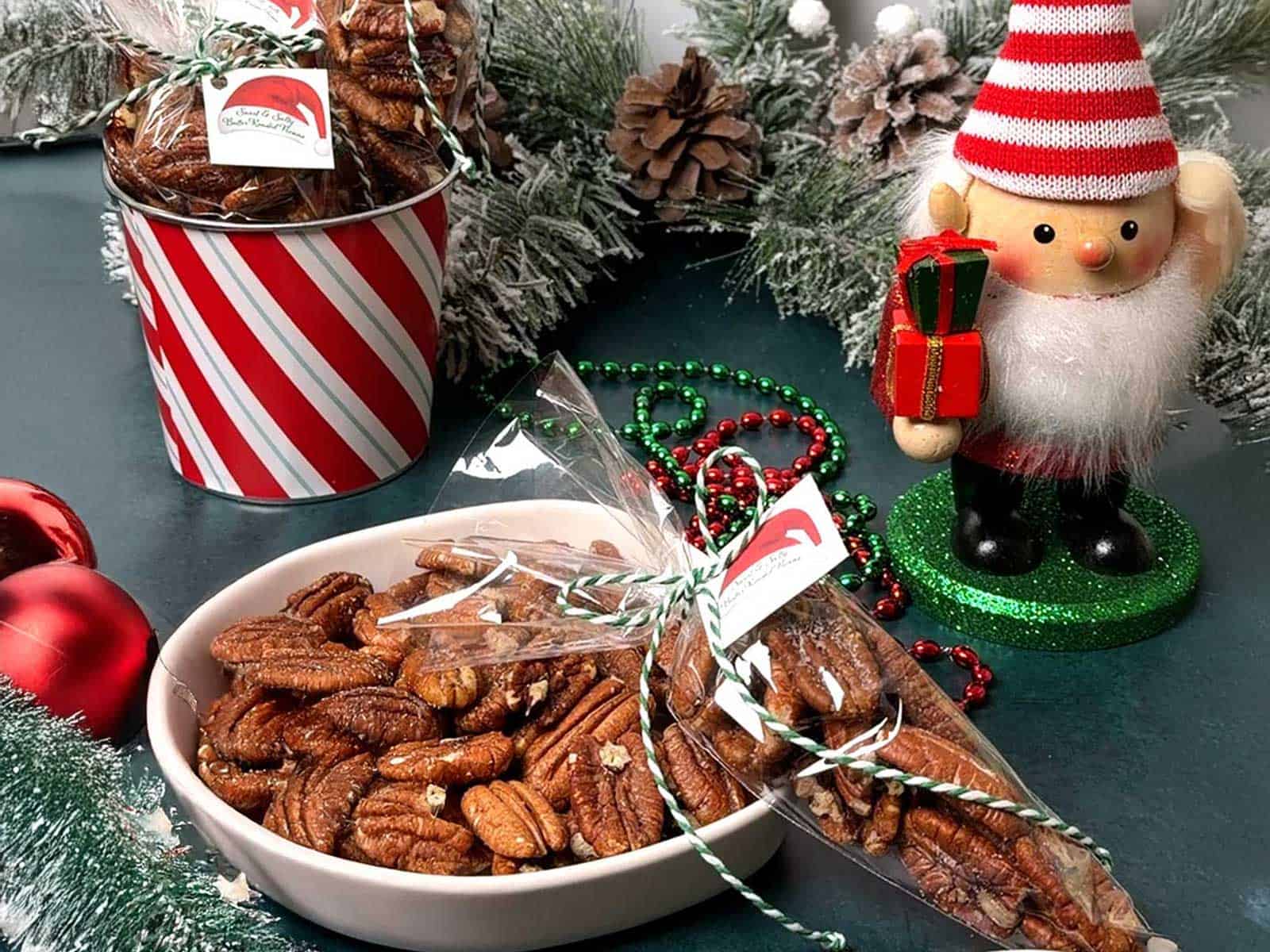 Toasted roasted pecans piled in a festive serving bowl