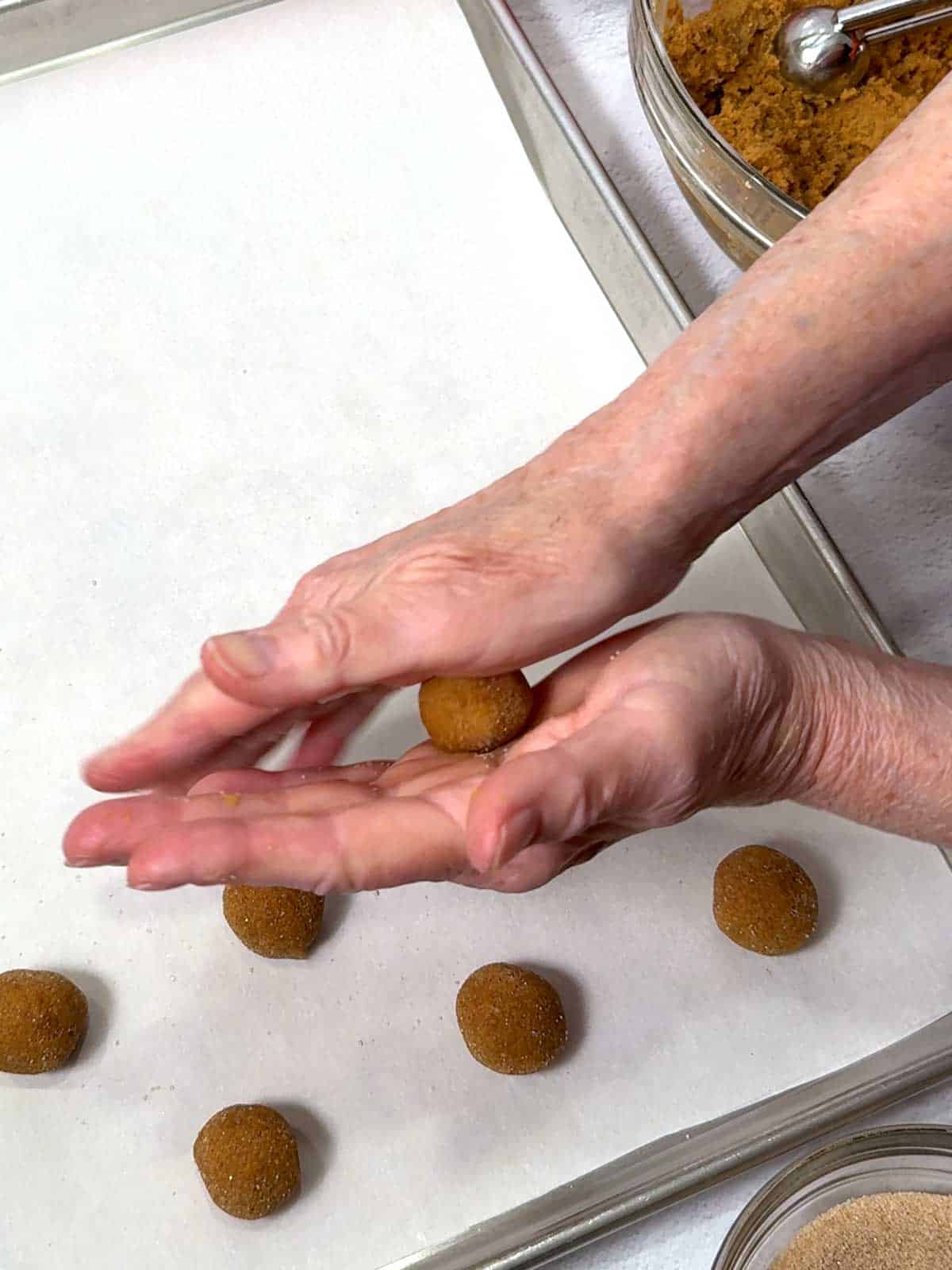 Rolling the dough between the palms of hand.
