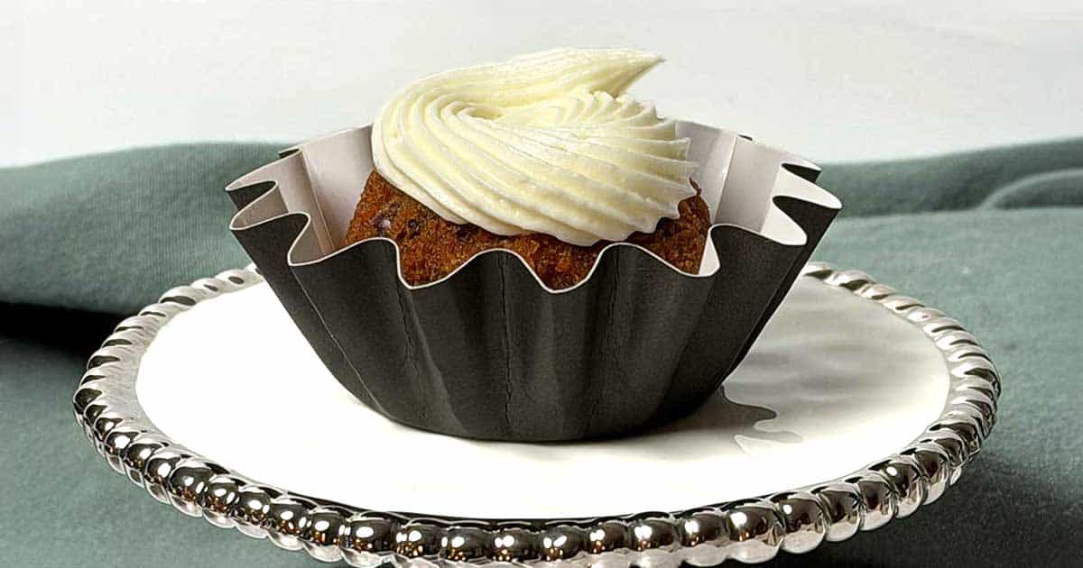 Mini carrot bundt cake with cream cheese swirled frosting.