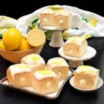 Lemon-curd filled hawaiian rolls with glossy glaze.