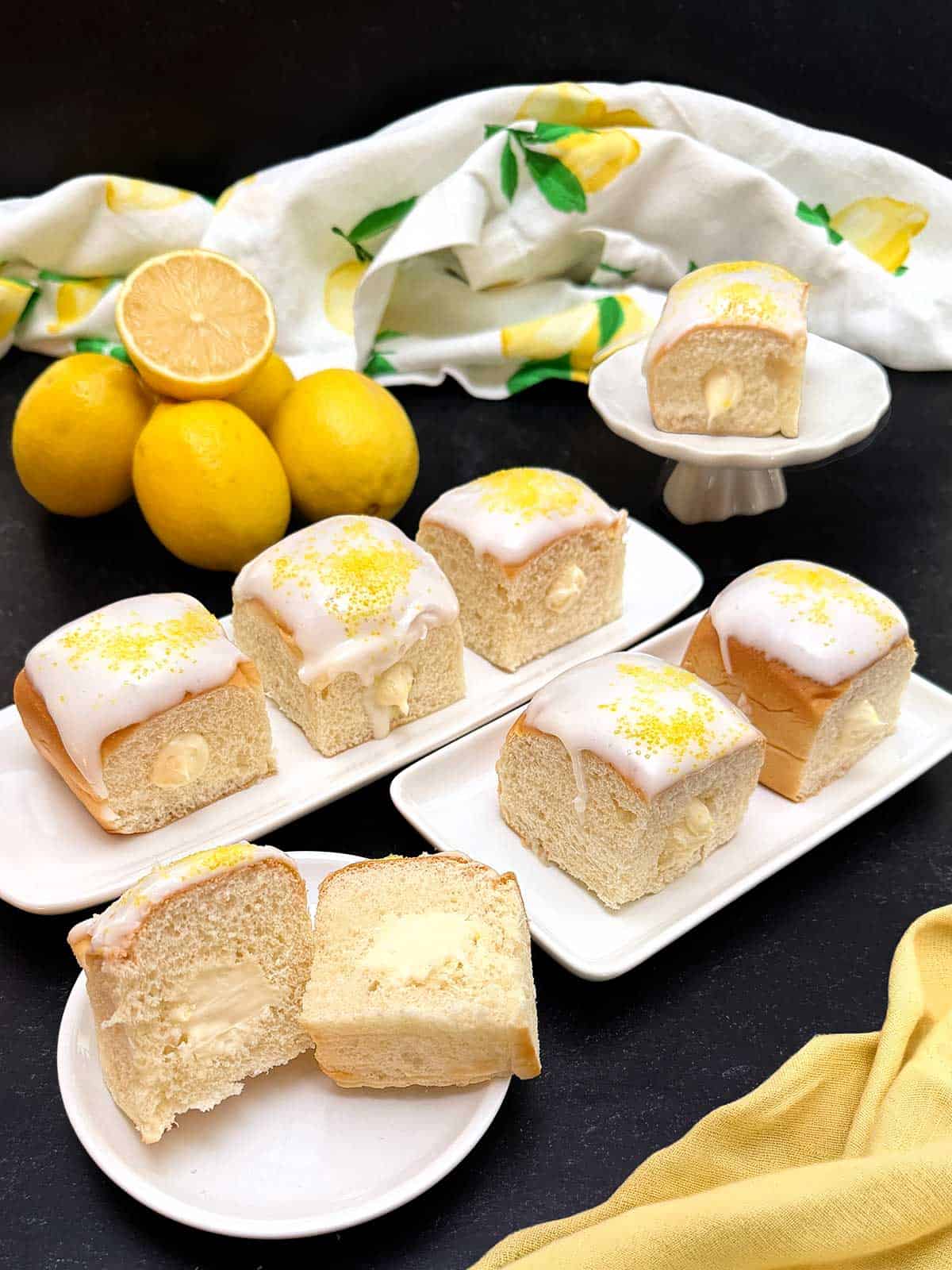 Lemon-curd-filled Hawaiian rolls with glossy glaze.